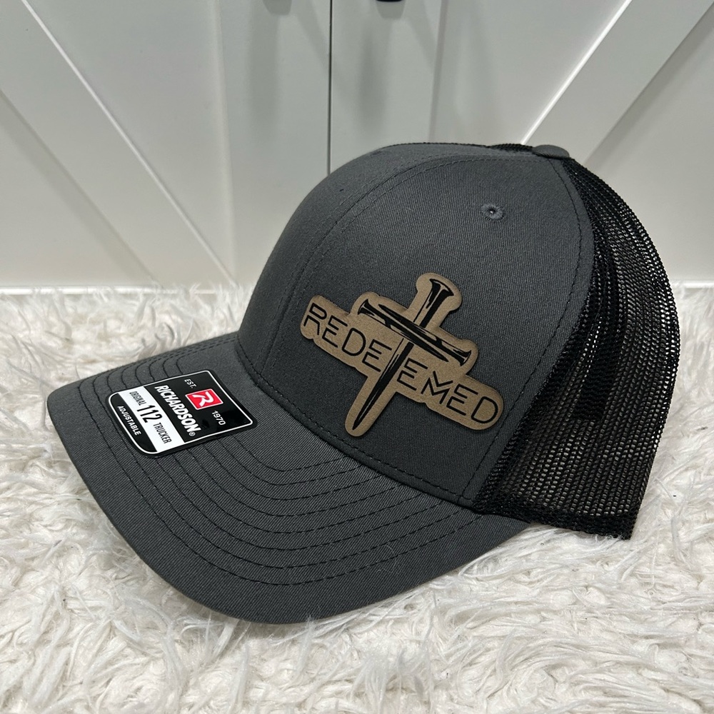 Laser engraved. Redeemed Richardson 112 trucker hat.